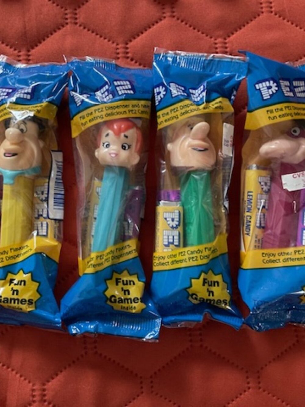 Four-piece 1992 Hanna-Barbera PEZ Dispensers: Fred, Barney, Pebbles & Dino